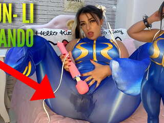 Enticing cosplay teenager dressed as Chun Li from street fighter playing with her htachi vibrator cumming and soaking her panties and pants ahegao